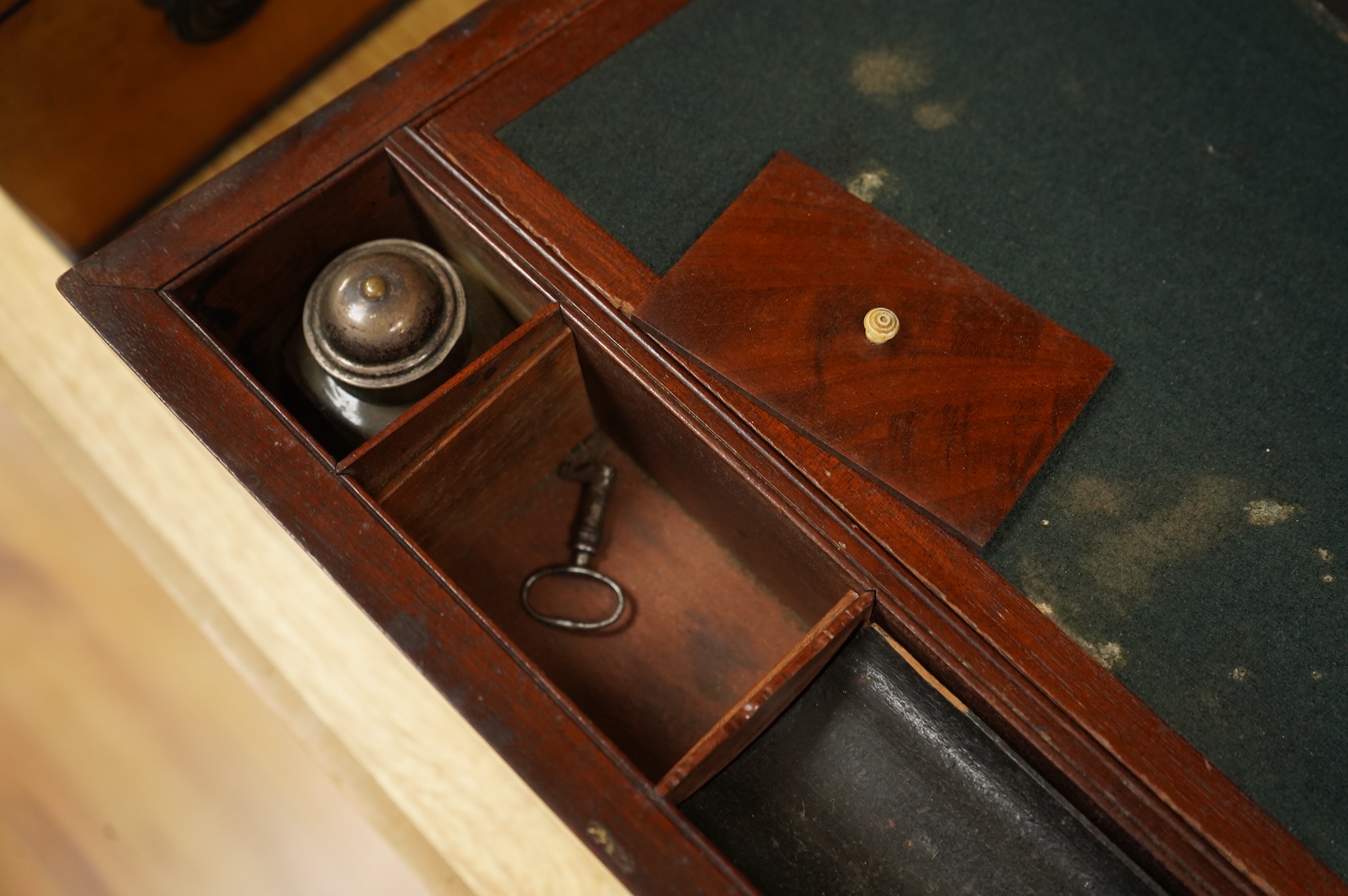 A bird’s-eye maple tea caddy and a brass mounted writing slope, latter 50cm wide